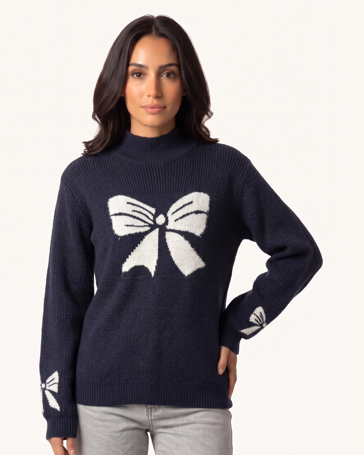 Dark blue mock-neck oversized pullover with large front bow knit and bow-pattern cuff