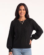 Black cable-knit sweater with a crew neck and balloon sleeves
