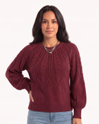 Burgundy cable knit sweater with a crew neck and balloon sleeves