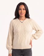 Cream cable-knit sweater with a crew neck and balloon sleeves