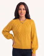 Mustard cable-knit sweater with crew neck and balloon sleeves
