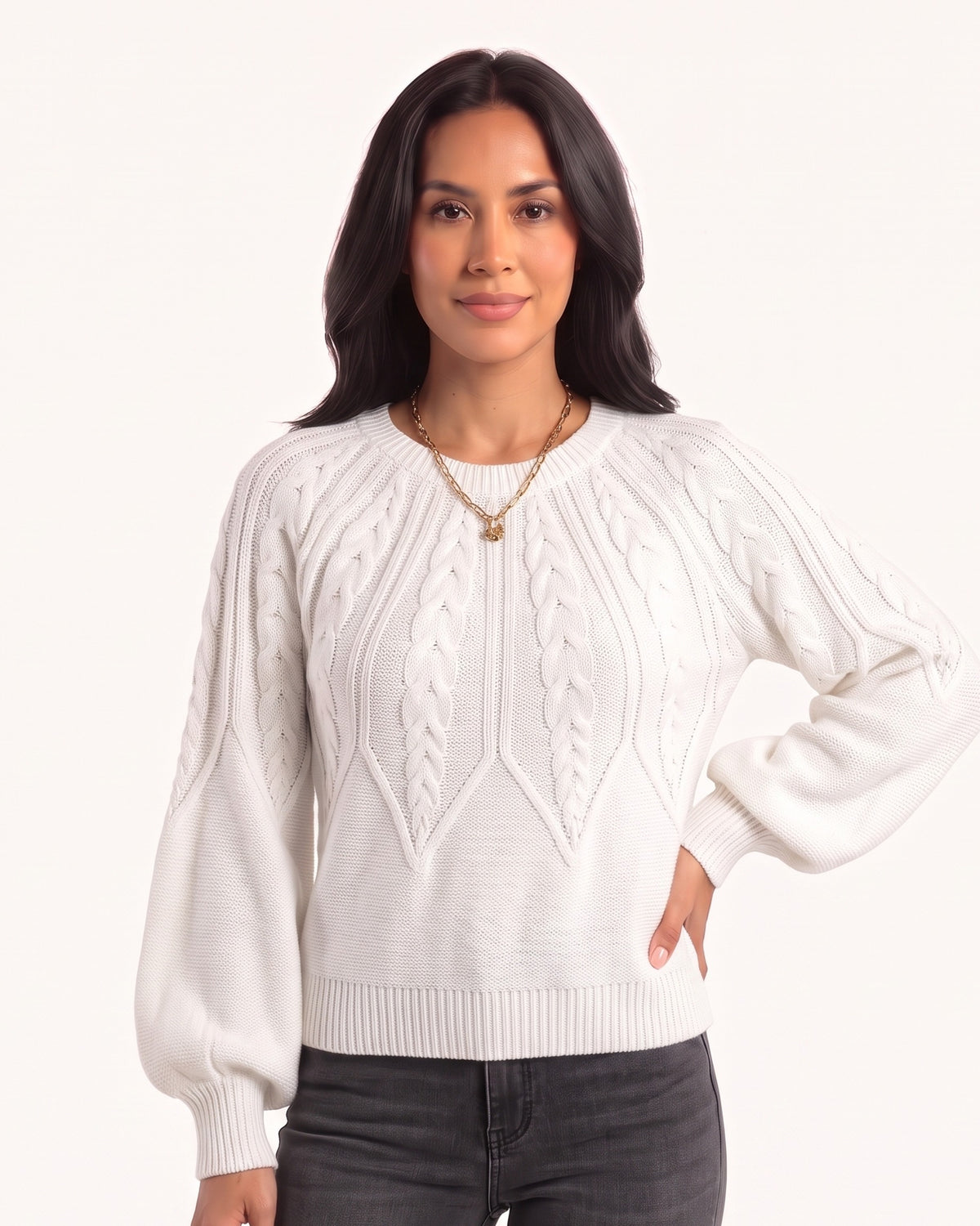 White cable-knit sweater with a crew neck and balloon sleeves