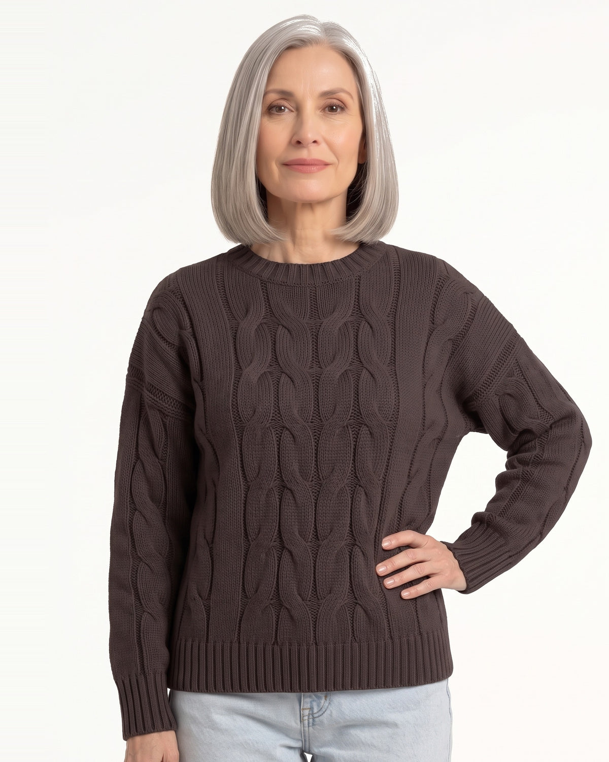 Dark brown cable-knit crew neck sweater with textured stitch pattern and ribbed hem