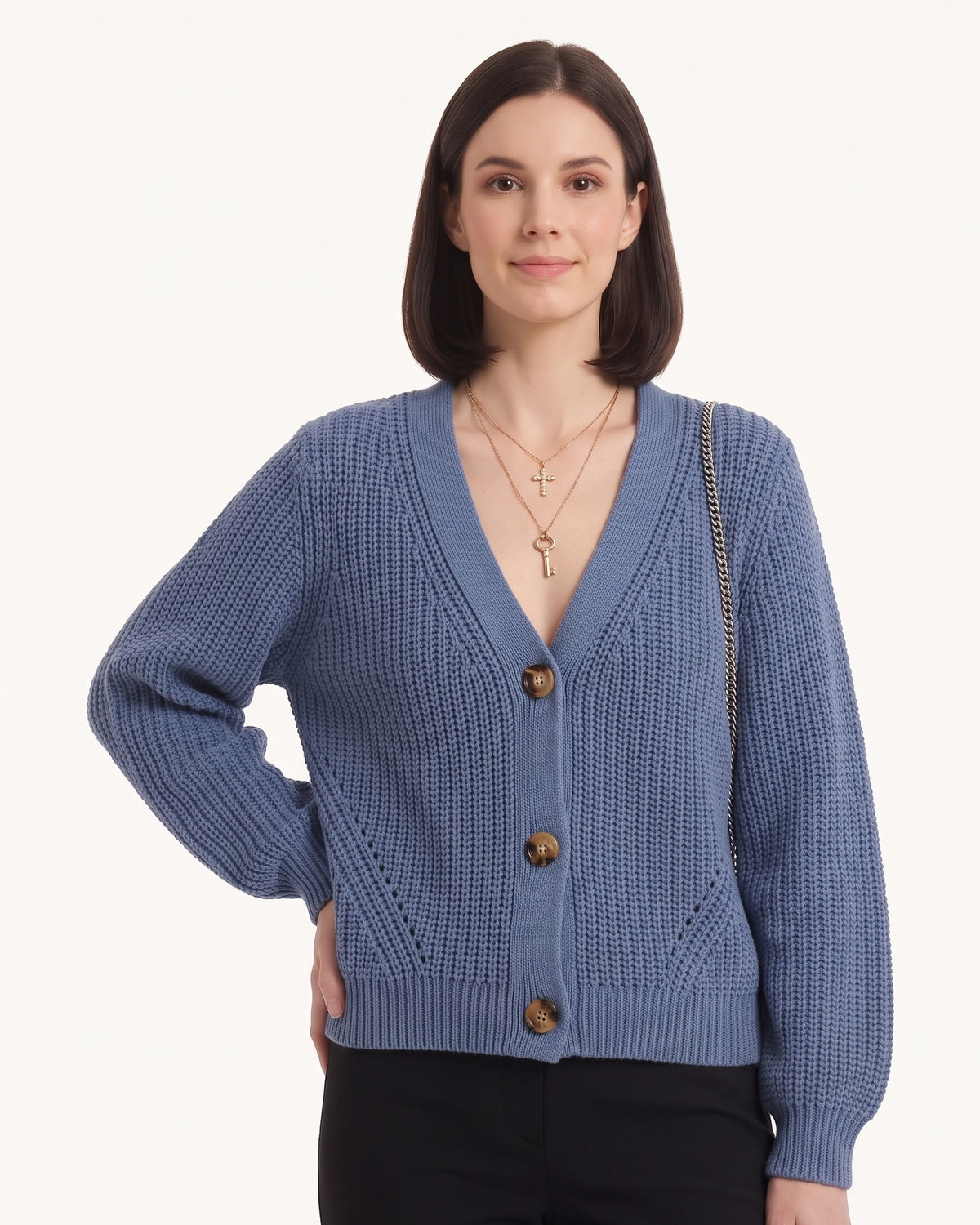 Chunky knit cardigan in dusty blue with V-neck, button front, and balloon sleeves