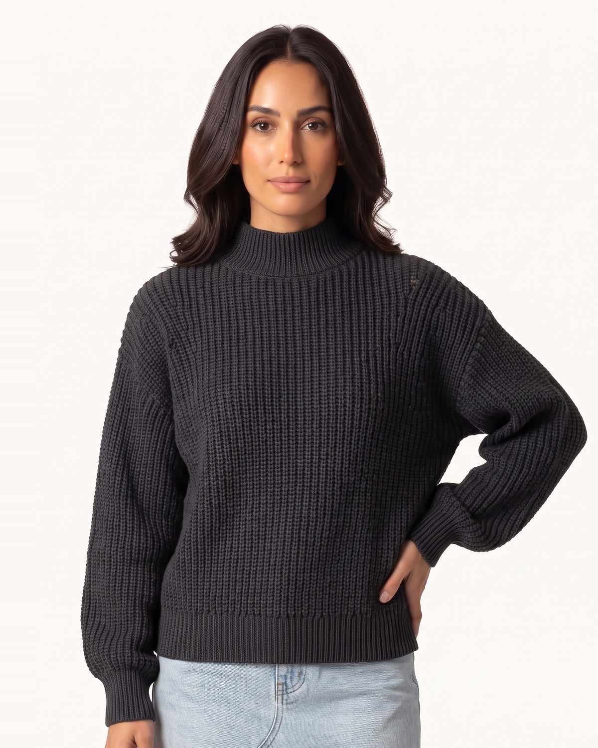 Dark gray women’s chunky knit mock neck pullover with ribbed hem and long sleeves