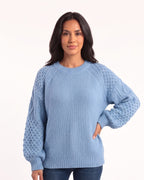 Women’s chunky knit sweater, light blue crew neck with ribbed hem and balloon sleeves