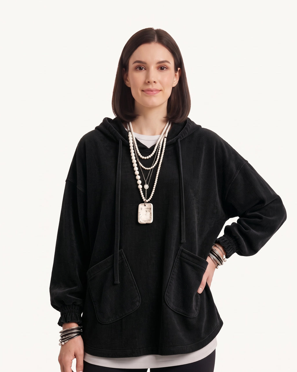 Black corduroy oversized hoodie with drawstring hood and patch front pockets