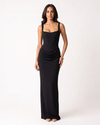 Black scoop-neck corset maxi dress, sleeveless fitted silhouette with draped waist.
