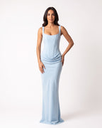 Light blue scoop-neck corset maxi dress, sleeveless fitted gown with draped waist.