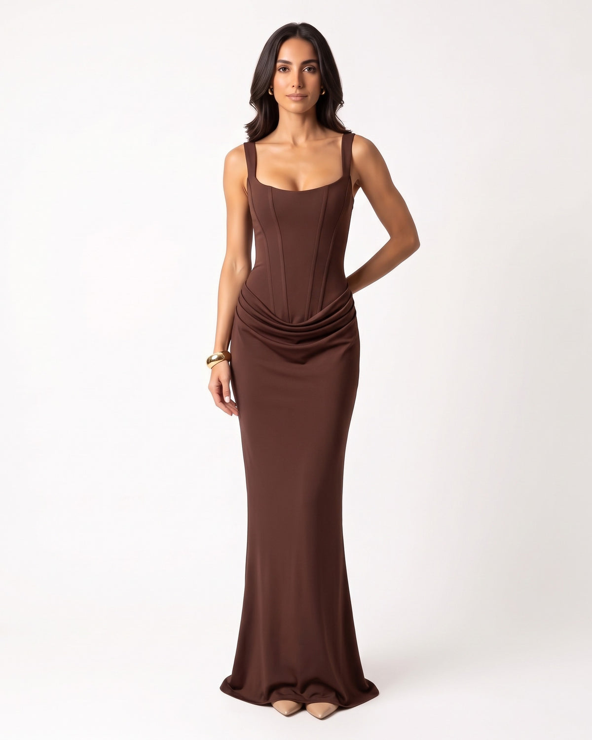 Brown scoop-neck corset maxi dress, sleeveless bodycon with draped ruching at hip.