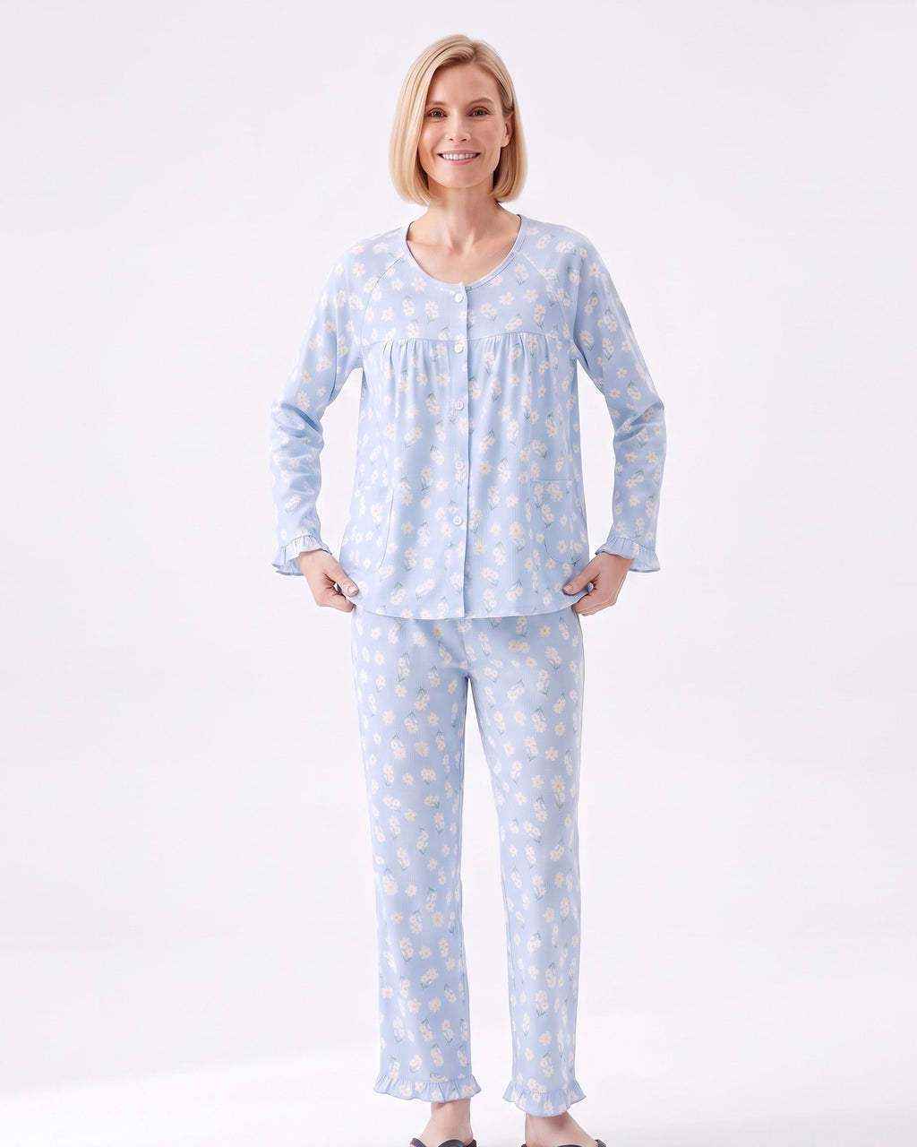 Light blue floral pajama set with long-sleeve button-front top and matching cuffed pants
