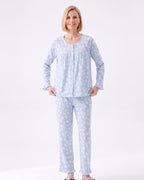Light blue floral pajama set with long-sleeve button-front top and matching cuffed pants