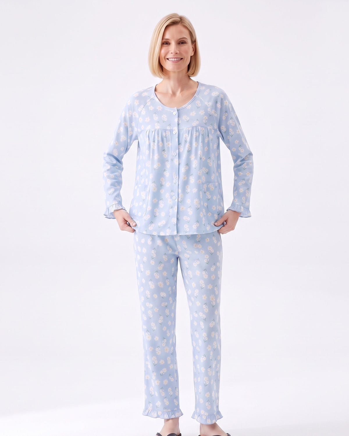 Light blue floral pajama set with long-sleeve button-front top and matching cuffed pants