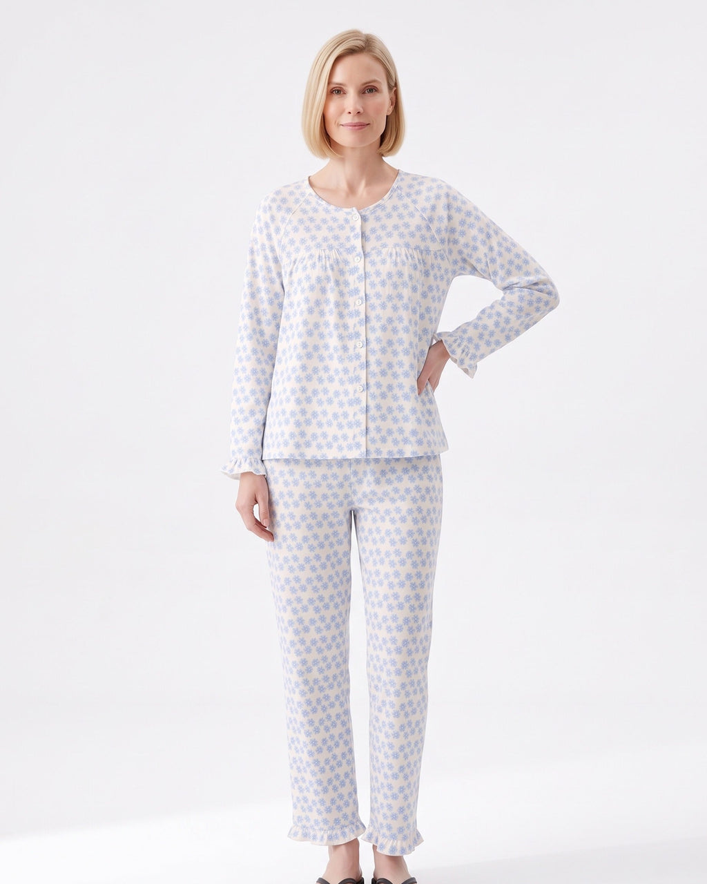 Sky blue floral print pajama set with long-sleeve button-front top and tapered pants