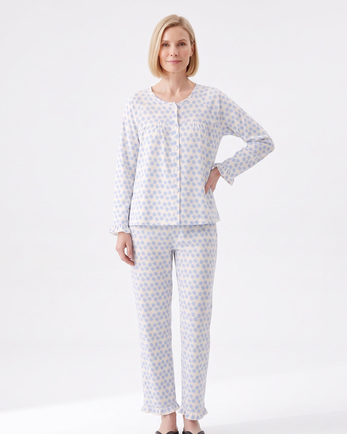 Sky blue floral print pajama set with long-sleeve button-front top and tapered pants