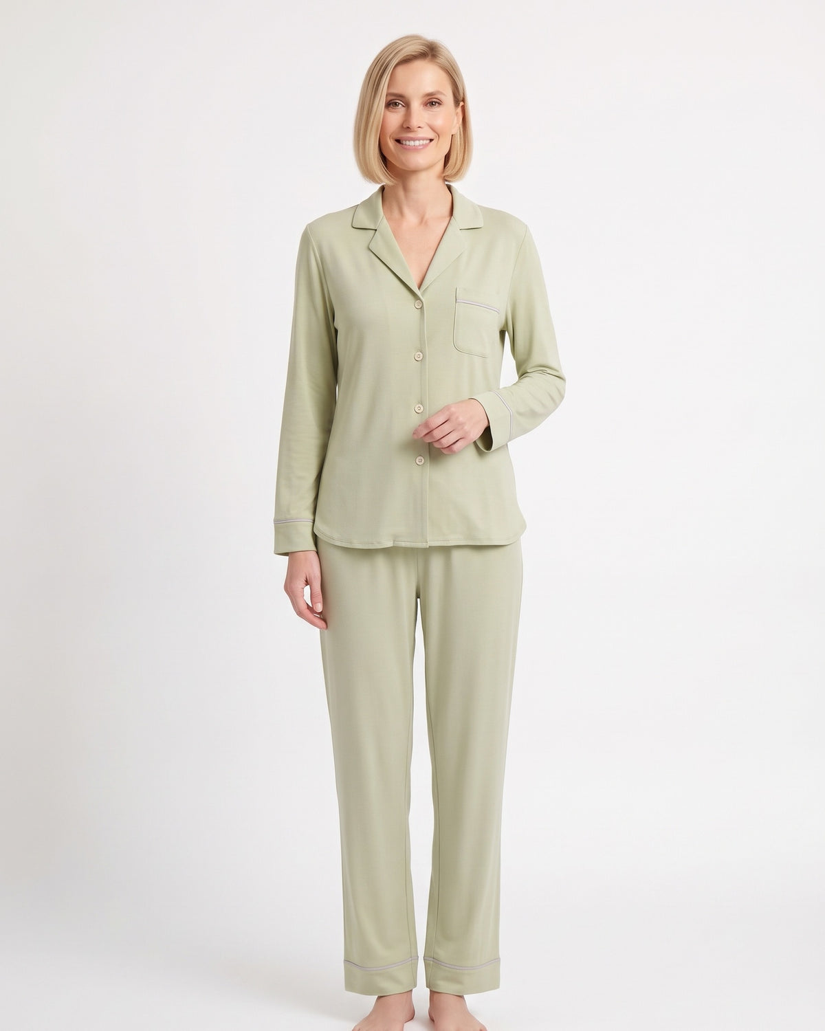 Light green pajama set with button-up shirt, chest pocket, and straight-leg pants