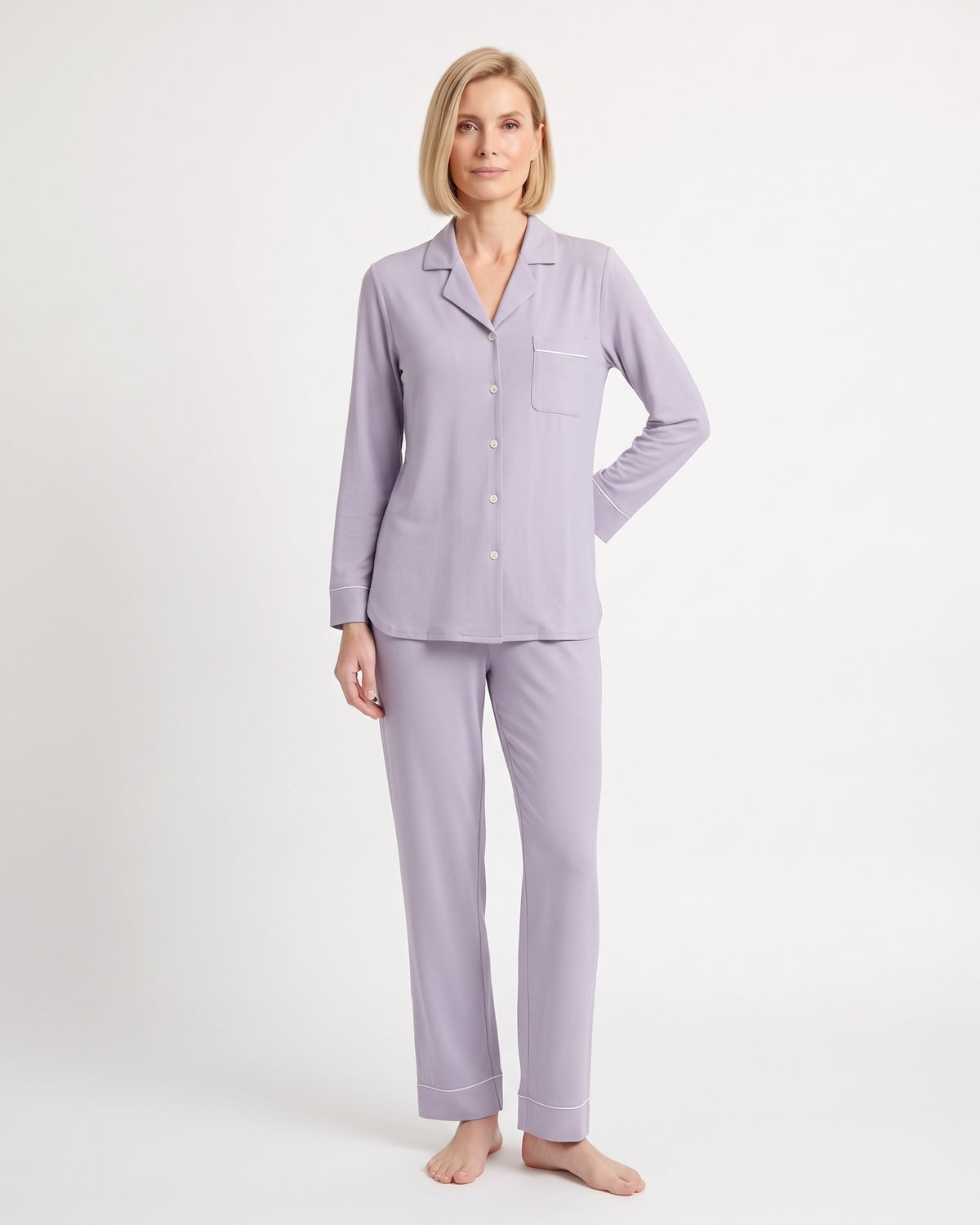 Light purple pajama set with button-up shirt, chest pocket, and straight-leg pants