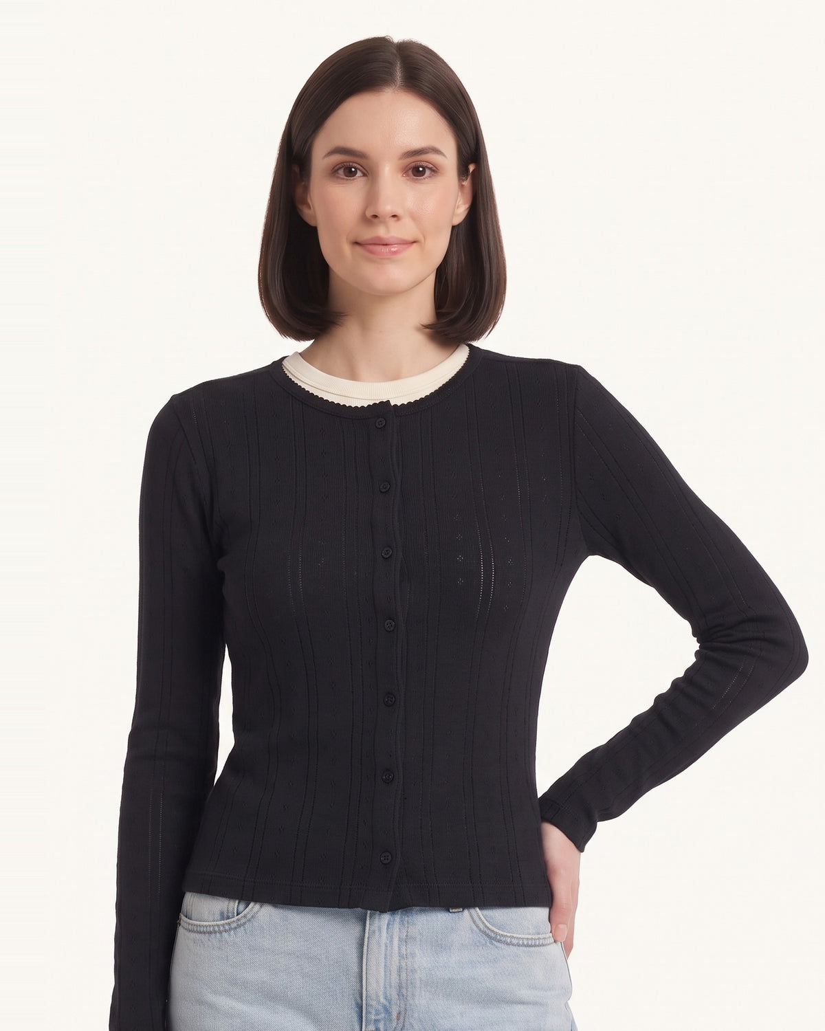 Black knit cardigan with button front, scalloped crew neck, long sleeves