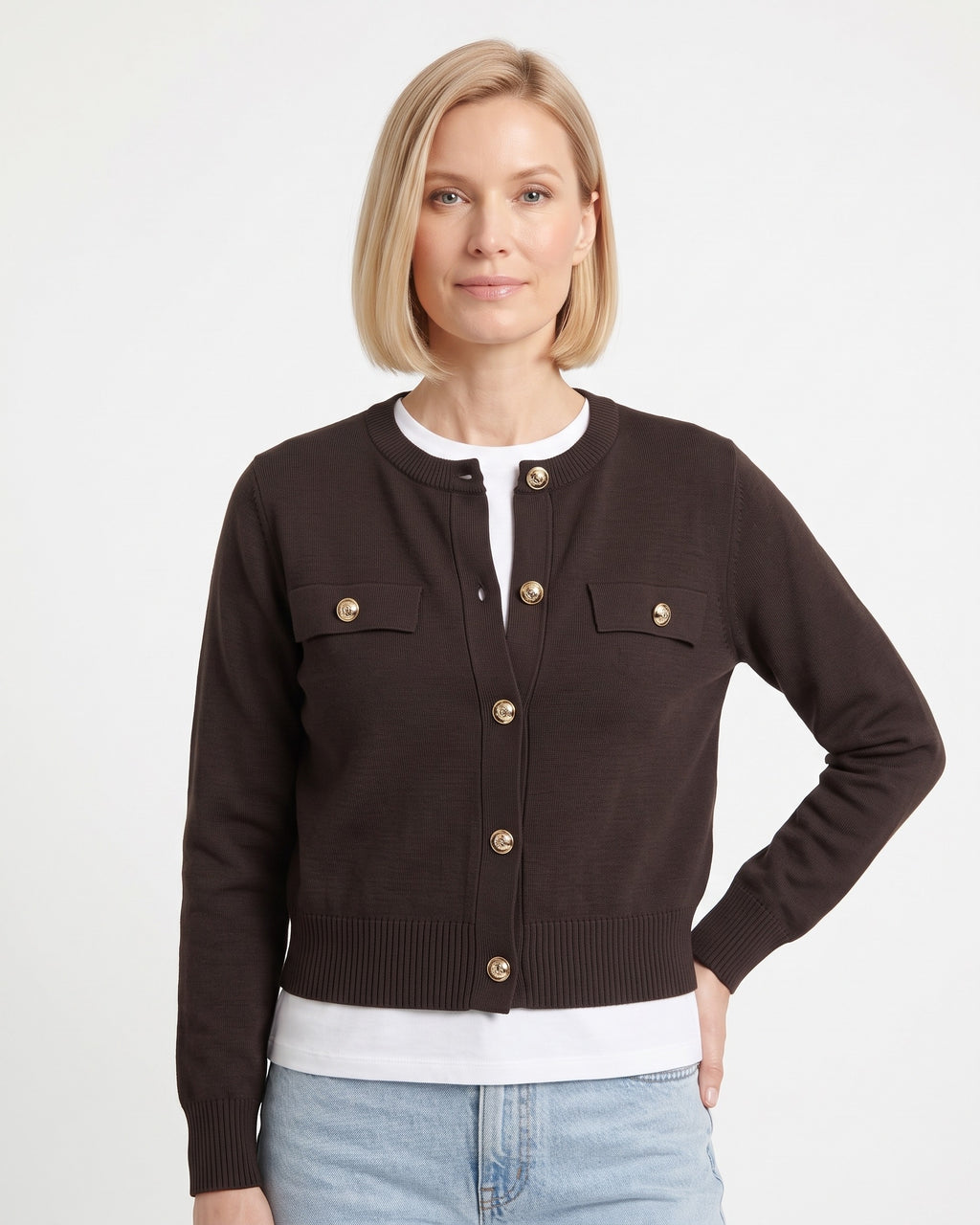 Dark brown cropped knit cardigan with crew neck, gold button front, flap pockets