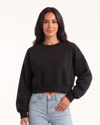 Black cropped crewneck sweatshirt with dropped shoulders and ribbed cuffs