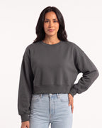 Cropped dark gray crewneck sweatshirt with oversized sleeves and ribbed hem