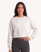 White cropped crewneck sweatshirt with long sleeves and ribbed cuffs and hem