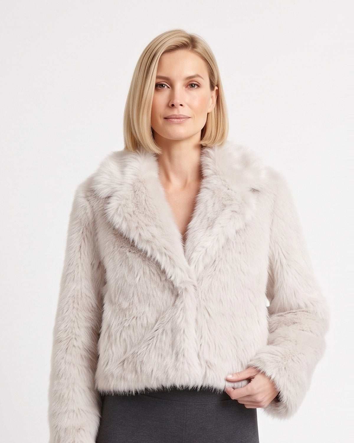 Cropped white faux fur jacket with wide shawl collar and open front