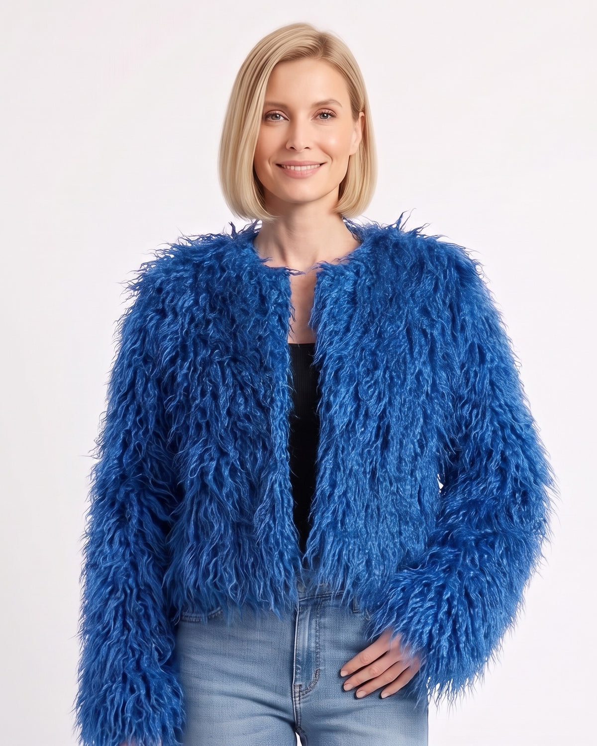 Cropped blue faux fur jacket with long shaggy pile and an open, collarless front