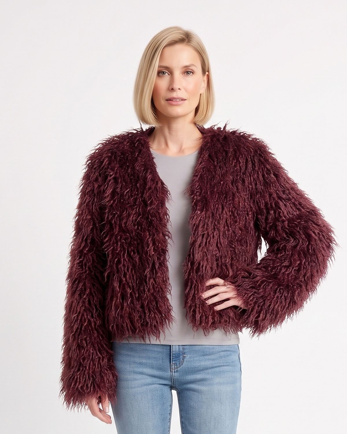 Burgundy cropped shaggy faux fur jacket with an open front and long sleeves