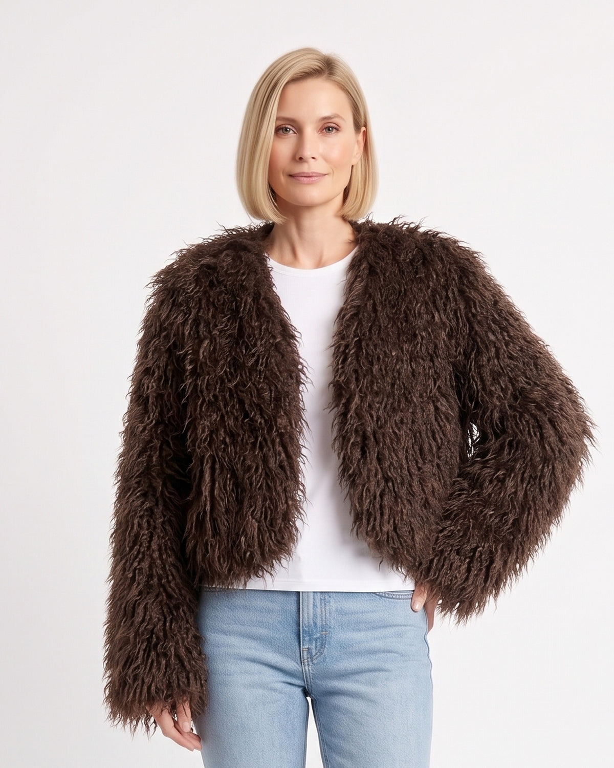 Dark brown cropped faux fur jacket with shaggy texture and open front