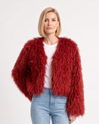 Red cropped shaggy faux fur jacket with an open front and long sleeves
