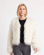 White cropped shaggy faux fur jacket with an open front and long sleeves
