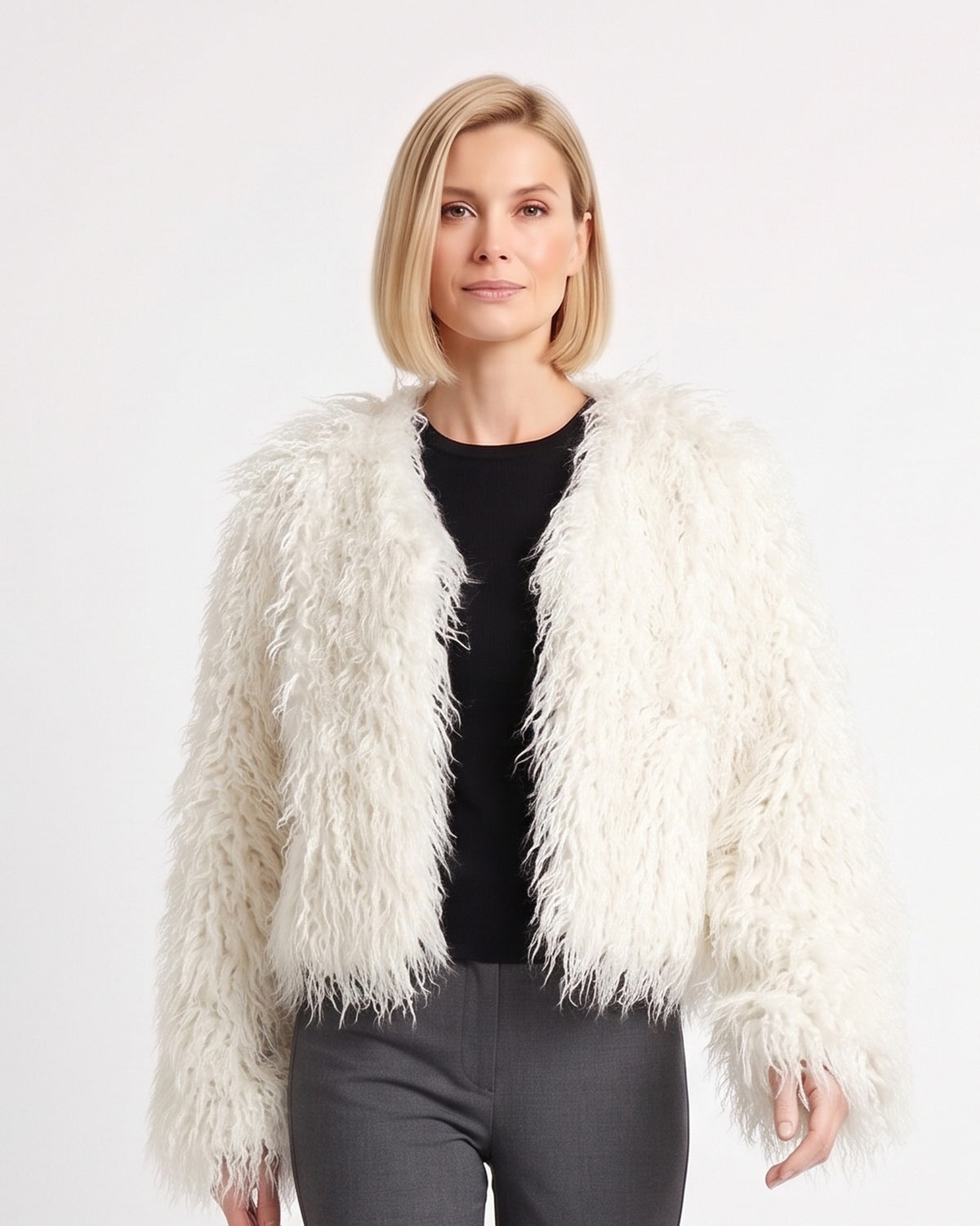 White cropped shaggy faux fur jacket with an open front and long sleeves