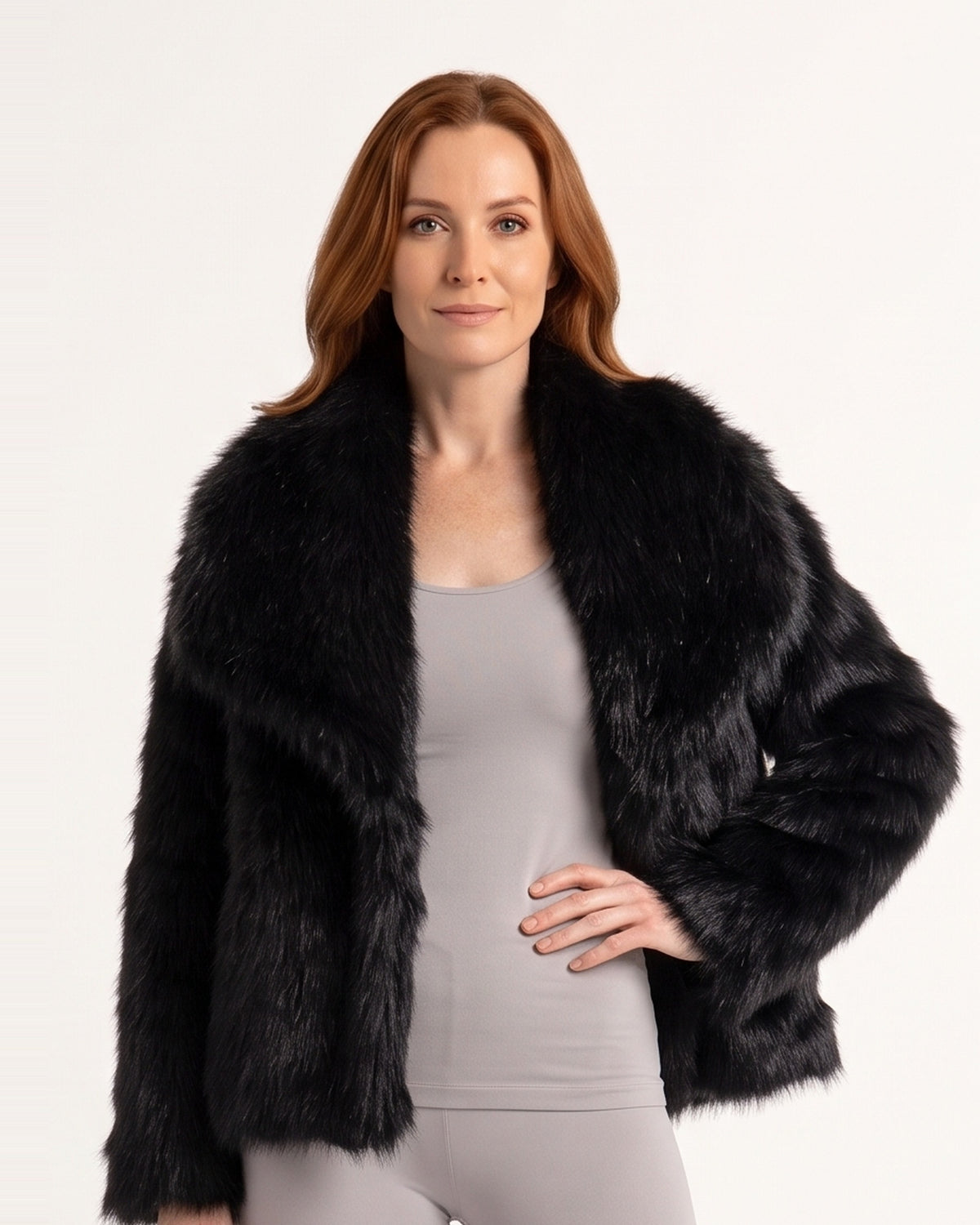 Black cropped faux fur jacket with fluffy texture and wide oversized collar