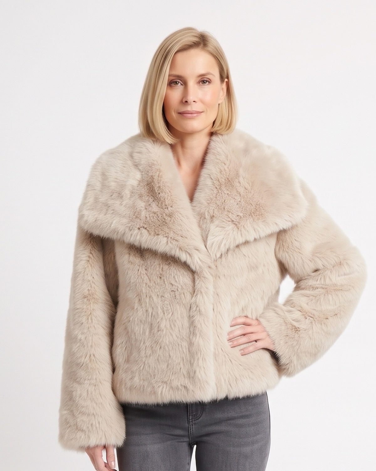 Beige cropped faux fur jacket with oversized lapel collar and long sleeves