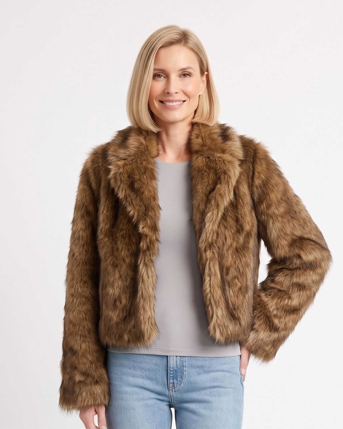 Cropped brown faux fur jacket with shaggy texture, open front, long sleeves