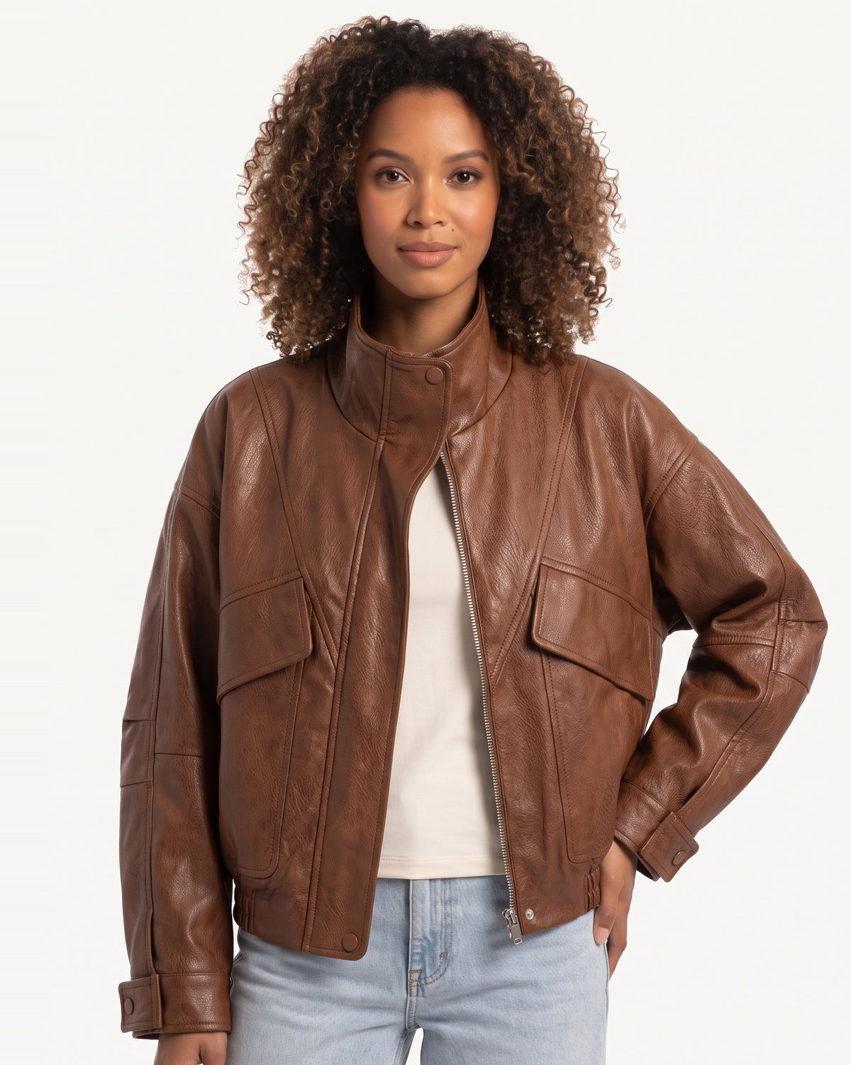 Brown faux leather jacket with stand collar and front zip, flap pockets