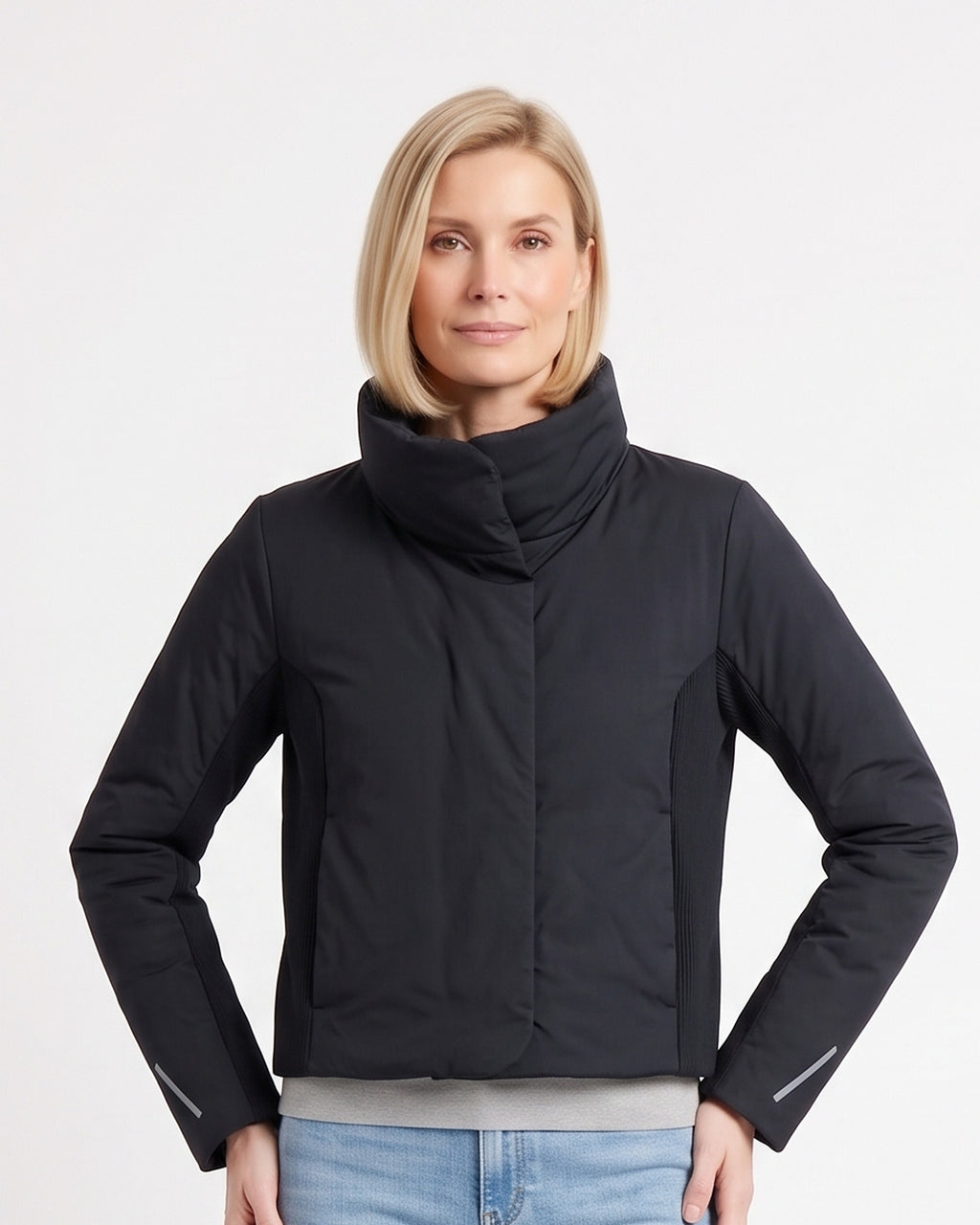 Women's cropped black puffer jacket with funnel neck and ribbed side panels