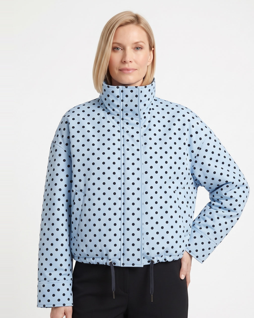 Women’s cropped puffer jacket in light blue with navy polka dots and stand collar