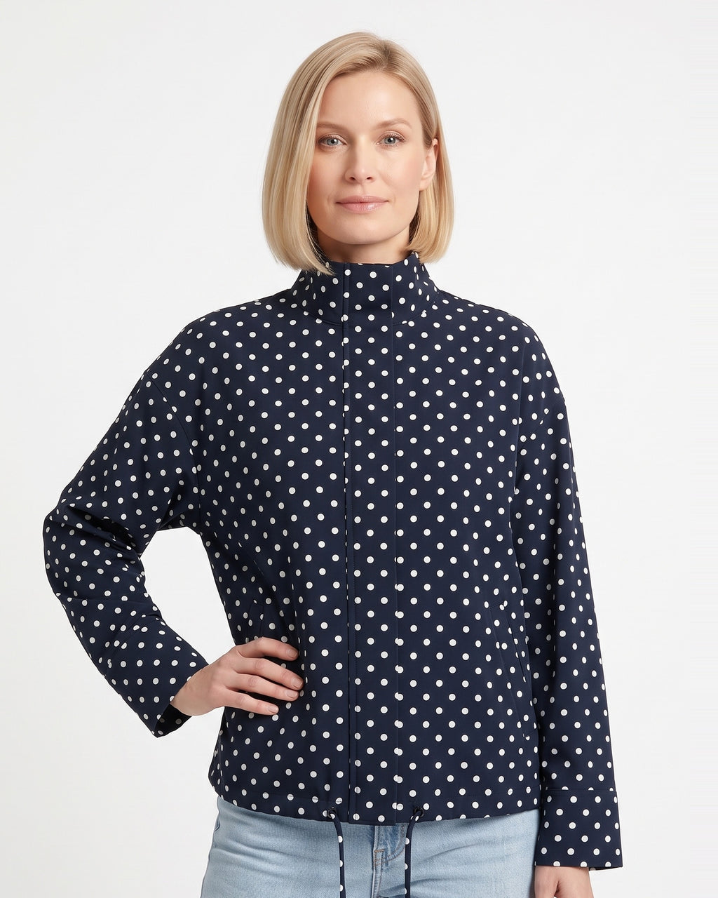 Navy polka dot cropped puffer jacket with stand collar and zip front