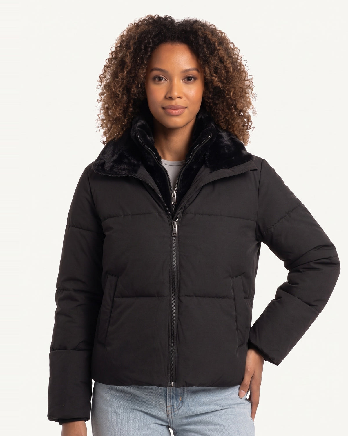 Cropped puffer jacket in black with faux fur stand collar and zip front.