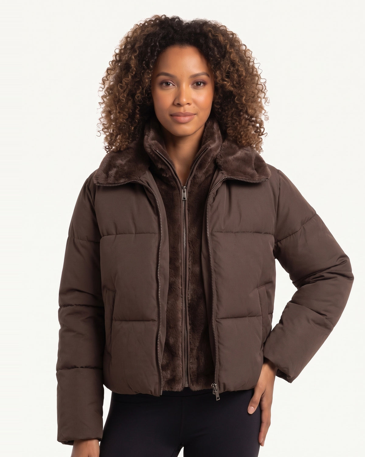 Cropped puffer jacket in dark brown with faux fur lining and zip front.