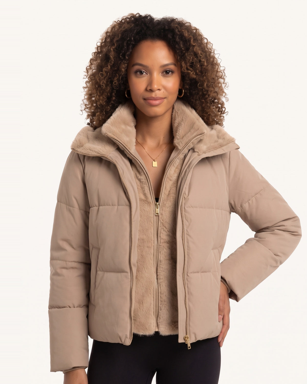 Cropped puffer jacket in taupe/tan with faux fur stand collar and front zipper.