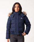 Front view of women's navy cropped puffer jacket with faux-fur hood and zipper