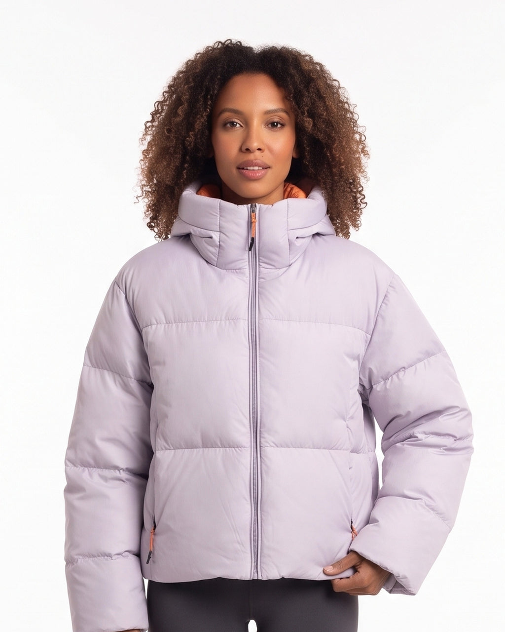 Cropped hooded puffer jacket in light purple with full front zipper and thick quilting.