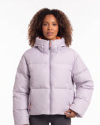 Cropped hooded puffer jacket in light purple with full front zipper and thick quilting.