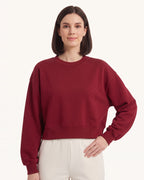 Women’s cropped crewneck sweatshirt, oversized drop-shoulder style in burgundy red