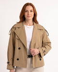 Beige cropped trench coat with double-breasted buttons, belted waist, cuff tabs