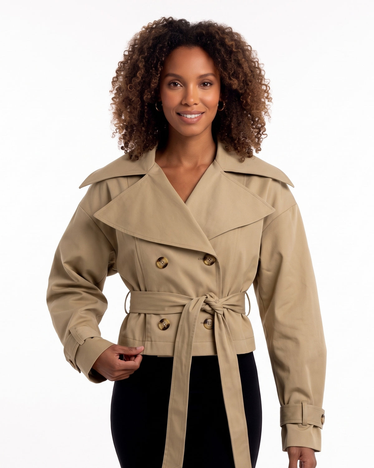 Tan cropped trench jacket with wide collar, double-breasted button front, tied belt
