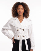 White cropped trench jacket with wide collar, double-breasted button front, tied belt